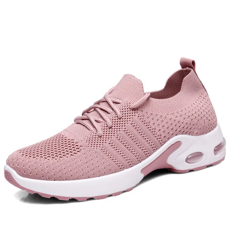 Women's black mesh lace-up casual sneakers with a round toe and non-slip sole on a white background.
