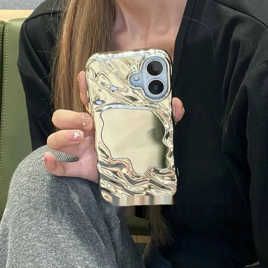 Water ripple texture solid colour mirror phone case for iPhone on a table.