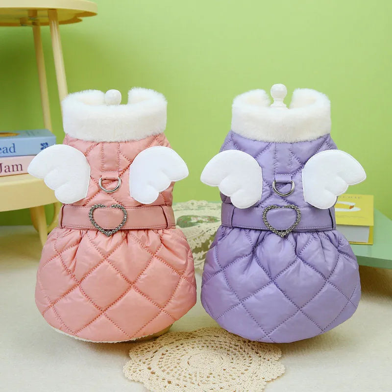 Small dog wearing pink thickened cotton skirt with casual angel-style design
