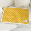 Soft blue terry cloth pet blanket for cats, shown on a pet bed, with size and colour options displayed.