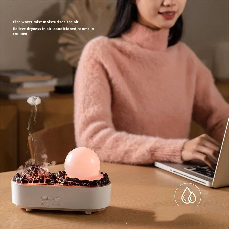 White volcano-shaped desktop humidifier with USB cable