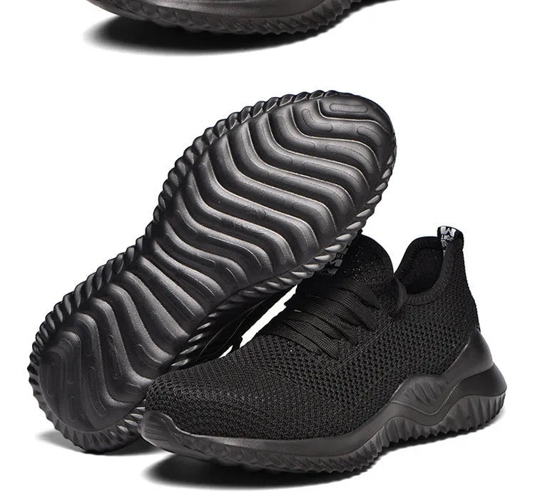 Black steel toe cap safety work shoes with a low-cut design and anti-static EVA sole.