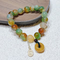 Peacock agate coloured women's bracelet with a peace buckle, made from agate and alloy.