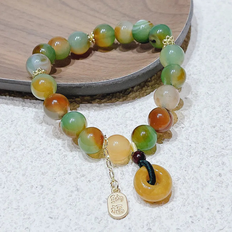 Peacock agate coloured women's bracelet with a peace buckle, made from agate and alloy.