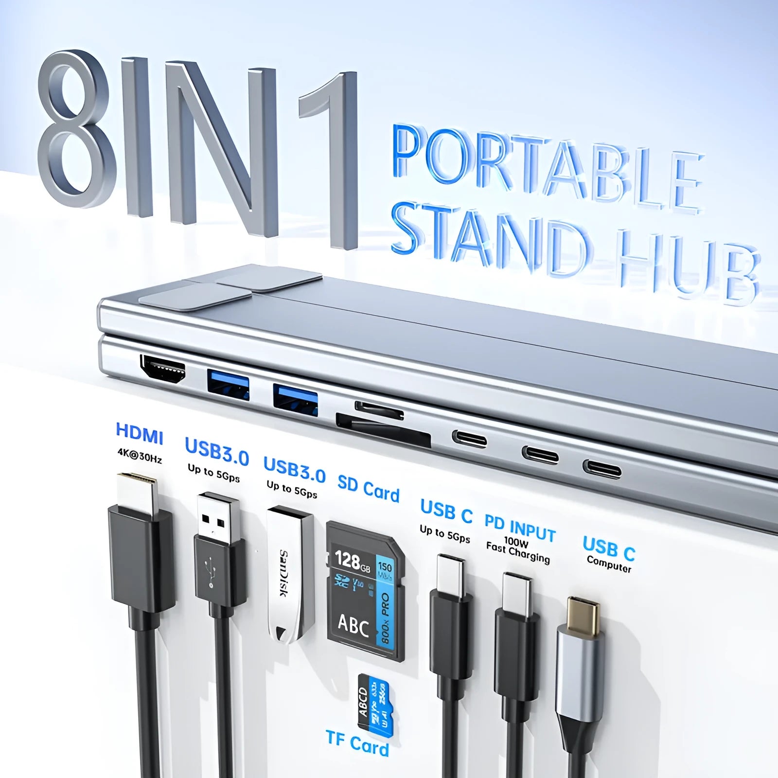 Silver aluminium folding laptop stand with integrated multi-port docking hub on a desk.