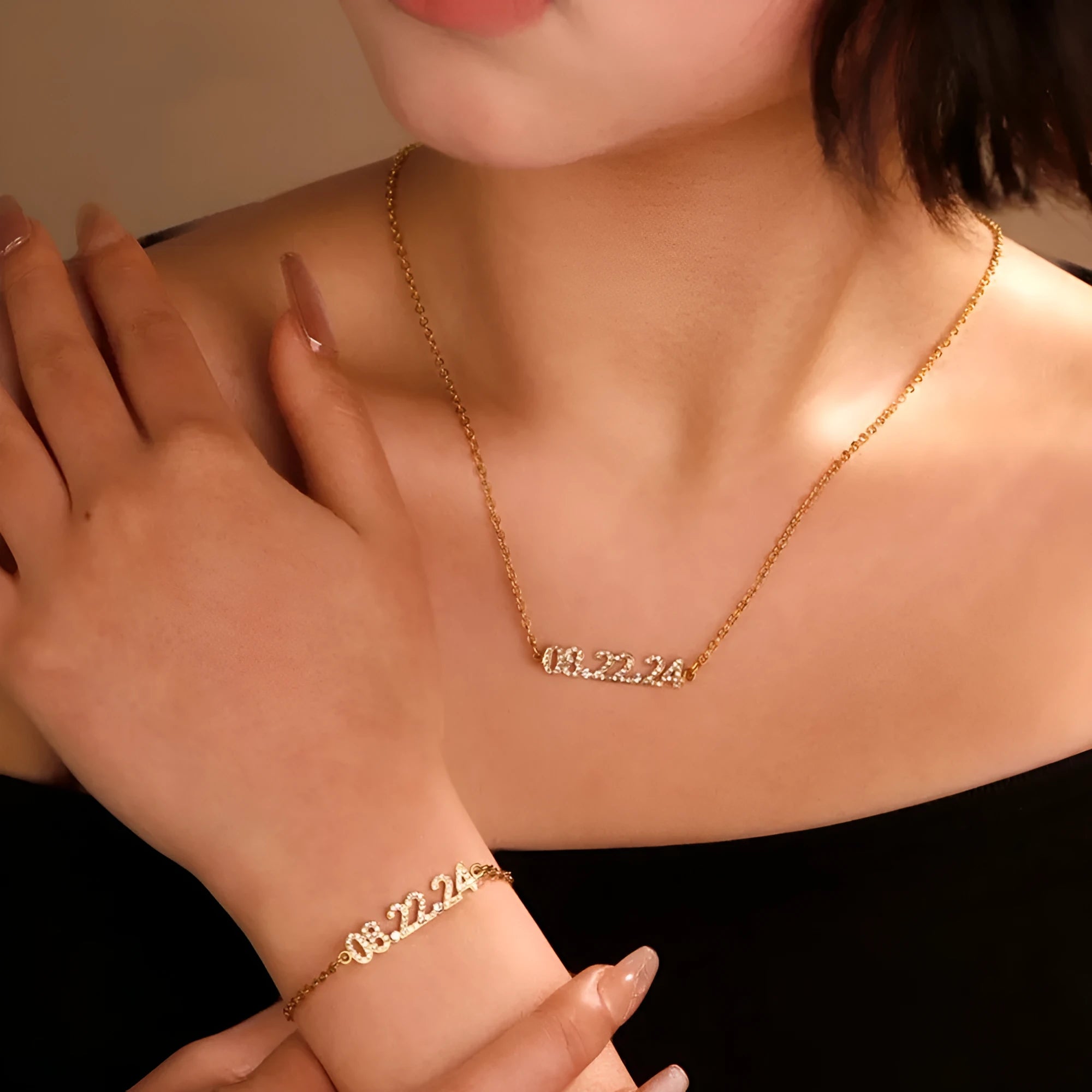 Stainless steel digital bracelet with diamond-studded numbers in gold finish