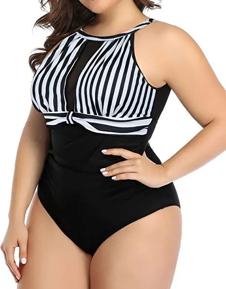 Women's black, striped, and red flower one-piece polyester swimsuit on hanger, sizes L to 4XL