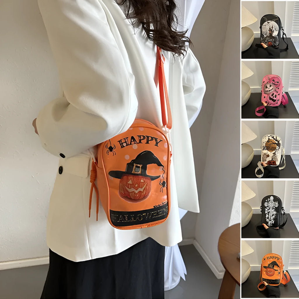 Black Halloween crossbody bag with orange pumpkin, white ghost, and bat graffiti print, shown on a model.