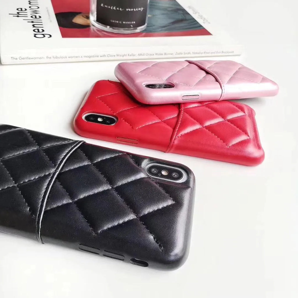 Black leather phone case for iPhone XS Max on a table