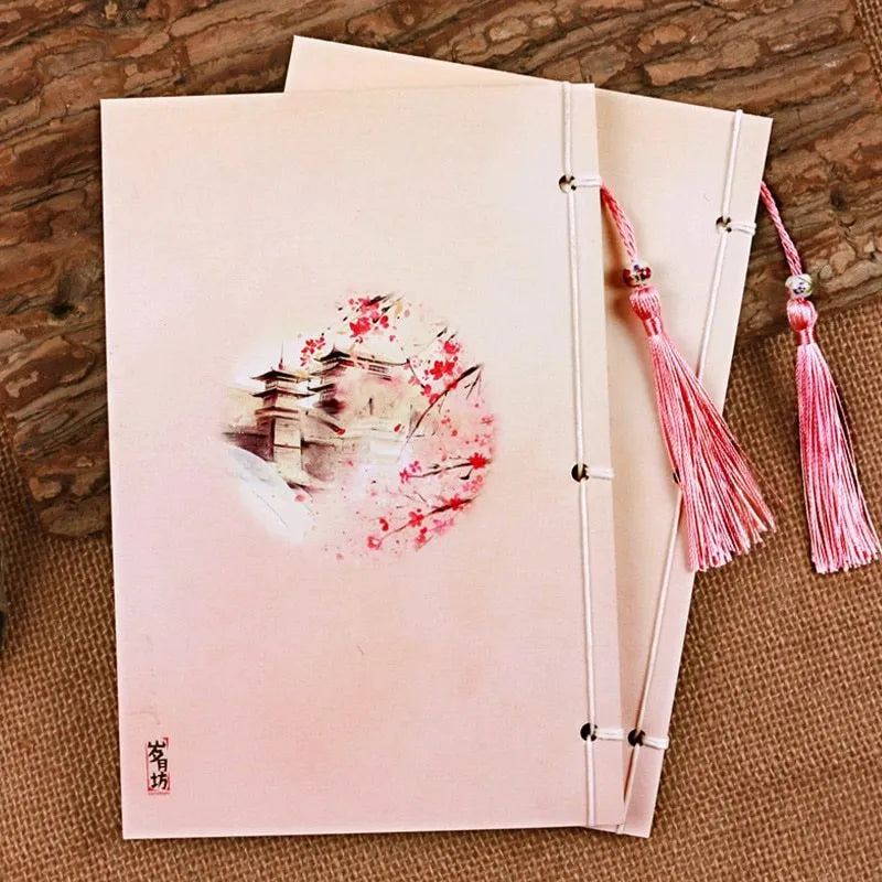 Azalea colour retro Chinese thread-bound notebook with 80g Dolin paper, 140x208mm size, lying open on a flat surface