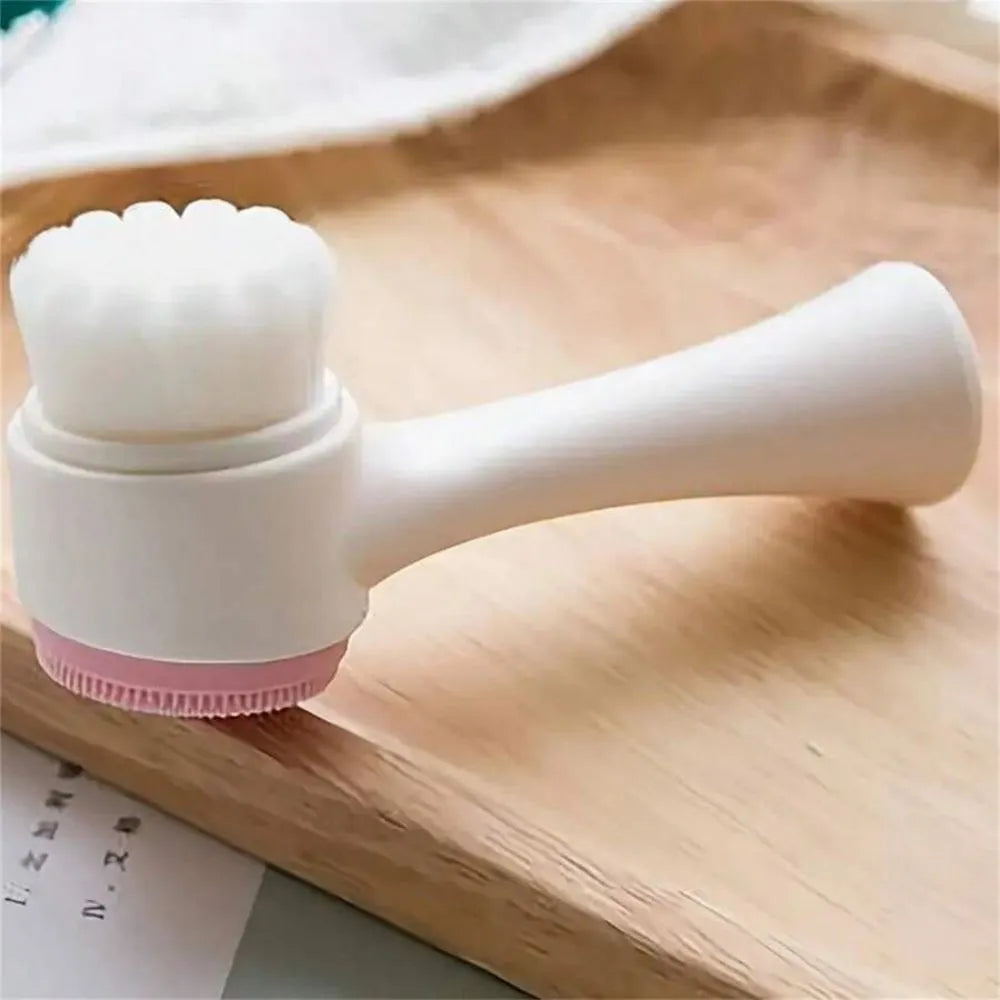 Blue and pink nylon bristle pet paw brush for dogs and cats on a white background.
