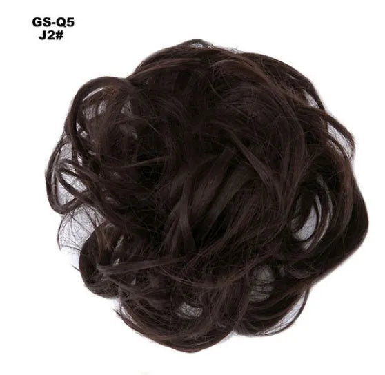 Adjustable hair ring in a natural black shade for creating hair buns and ponytails