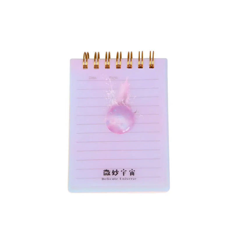 Pack of four A7 spiral-bound notebooks with decorative PP covers in various colours.