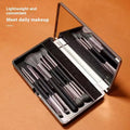 Portable makeup brush set with mirror showing artificial fibre bristles and plastic handles