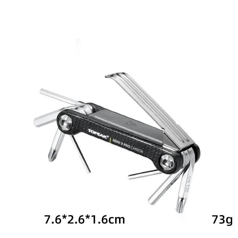 Stainless steel bicycle repair combination tool with 23 functions on a grey background