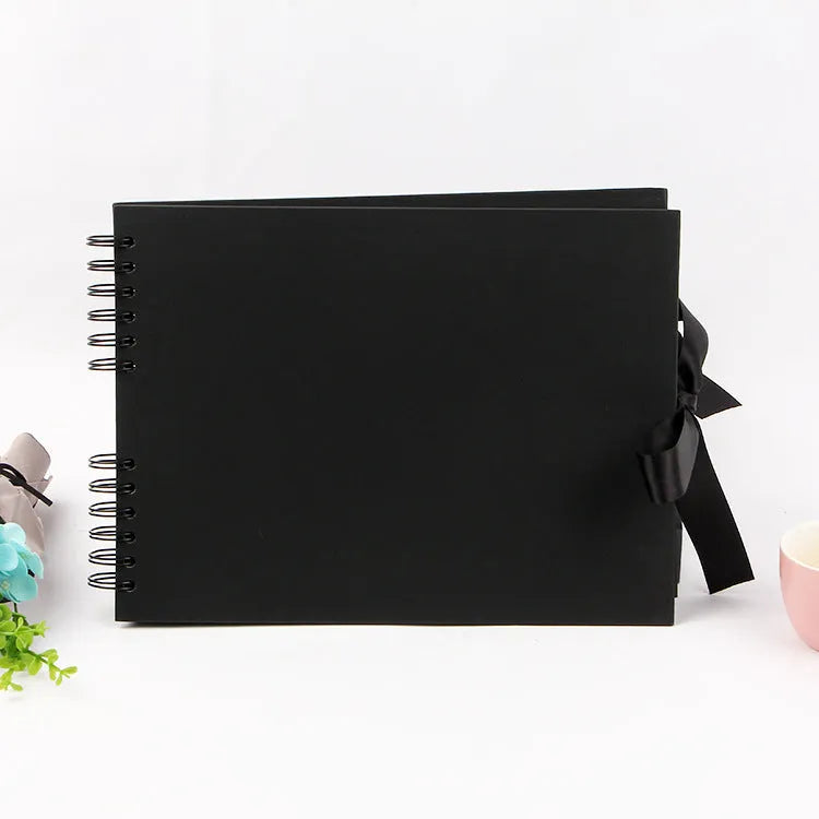 DIY handmade photo album with coil spiral binding in yellow or black cover measuring 290mm by 215mm