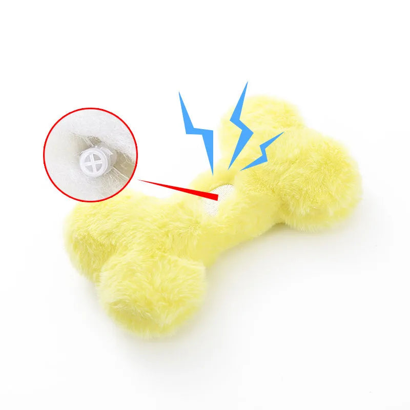 Blue love bone shaped plush dog toy with a squeaker, on a neutral background
