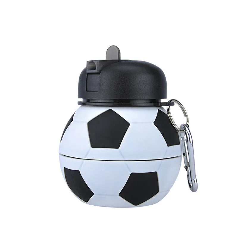 White collapsible silicone soccer water bottle with straw and carrying clip on white background