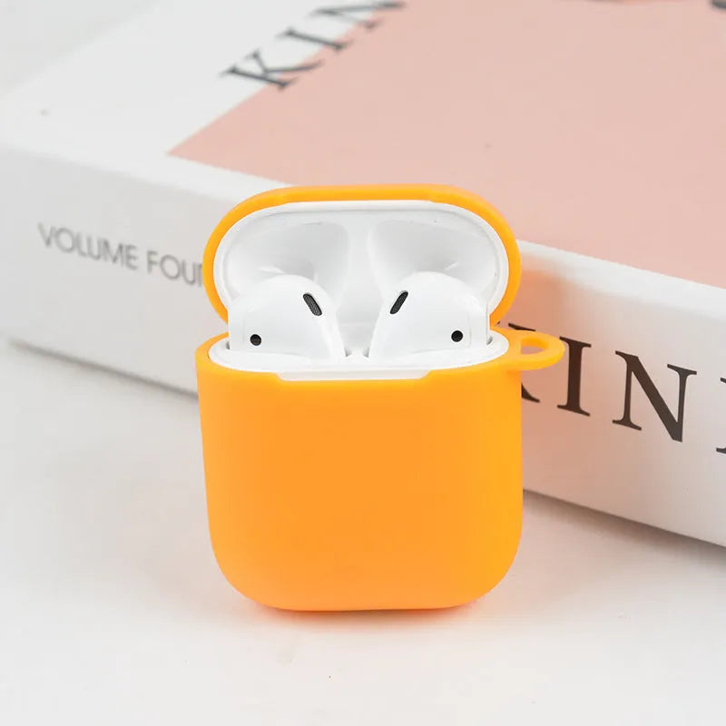 Silicone protective case for Bluetooth headset in assorted colours showing dimensions 56mm by 46mm by 22mm.