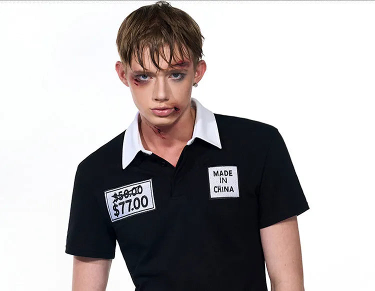 Black slim fit men's polo shirt with embroidery hat design on front, short sleeves and polo collar