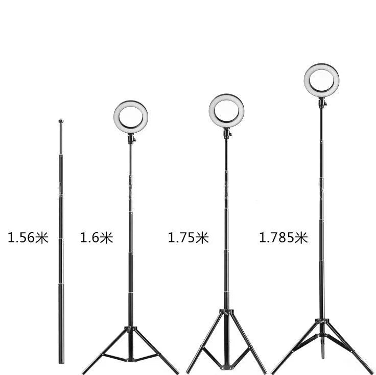 26cm RGB ring light set with tripod, selfie stick, and Bluetooth remote on a desk