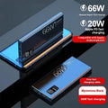 Black 50000 mAh 66W super fast charge power bank with plastic shell and USB Type-C cable on white background