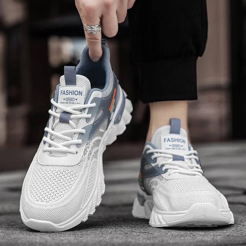 Men's white blue and black platform casual running shoes with cross shoulder straps and a rubber sole.