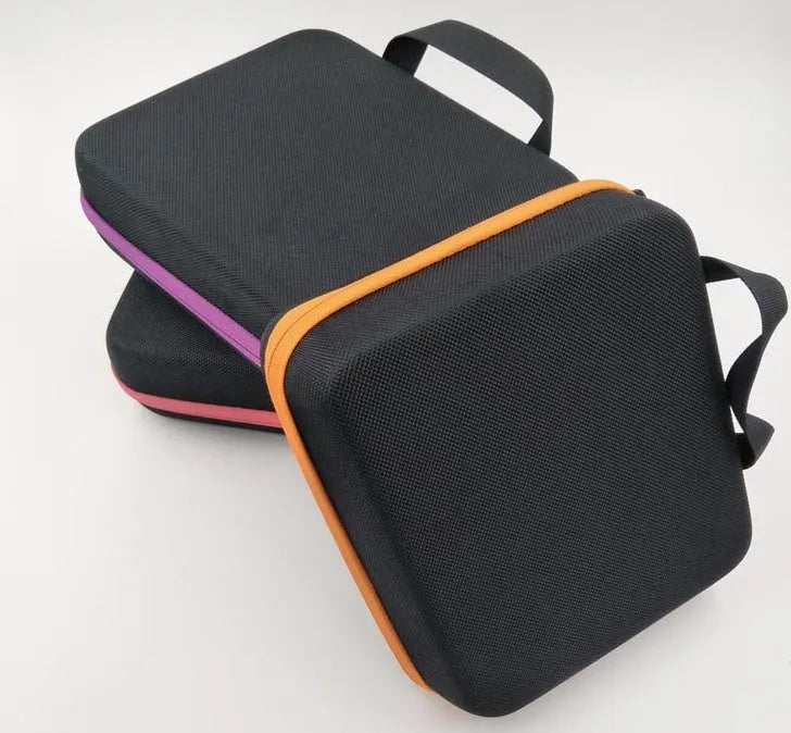 Cube-shaped EVA essential oil storage bag with 30 compartments for 15ml bottles, shown in red