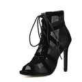 Black suede women's lace-up high heel shoes with a pointed toe and stiletto heel.