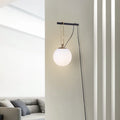 Nordic creative glass wall lamp showing three light colour options on modern wall