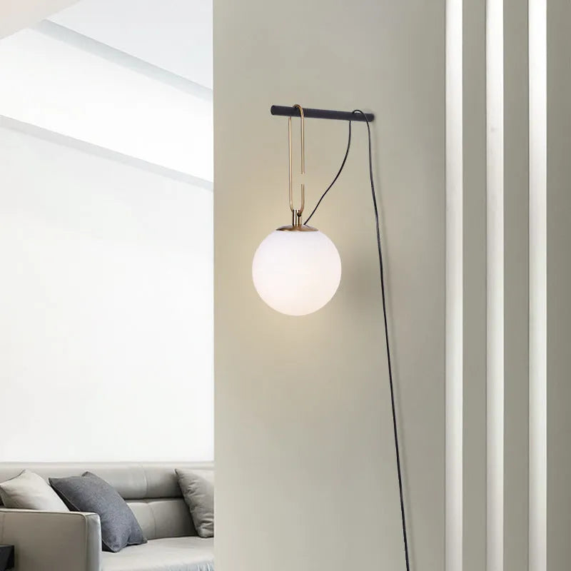 Nordic creative glass wall lamp showing three light colour options on modern wall