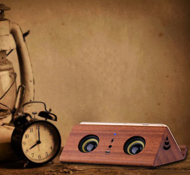 Bronze wooden home speaker with wooden shell, 3.5mm connection, and control panel on top
