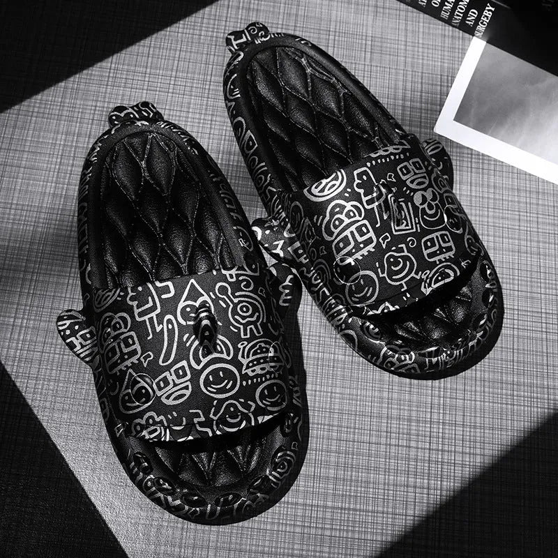 Pair of open-toe EVA home slippers with a shark design on a white background.