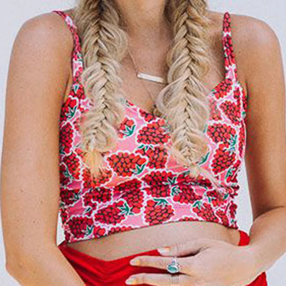Red high waist maternity swimsuit with matching swim trunks on a pregnant woman