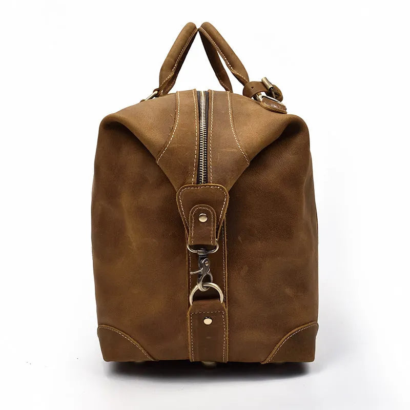 Genuine cowhide leather large capacity luggage bag in light brown with zipper closure and top handles