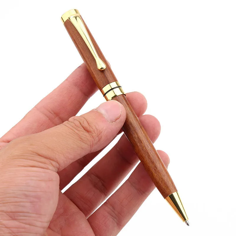 Wooden metal ballpoint pen with rosewood barrel on white background