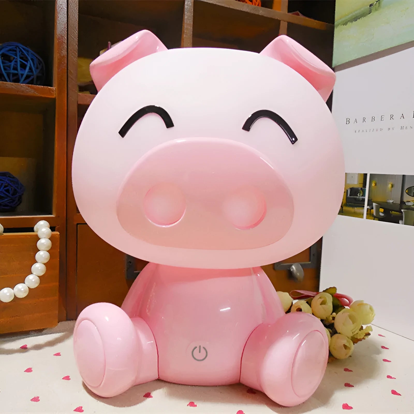 Cartoon pig small night lamp in blue showing soft LED glow, ABS body with USB power connection