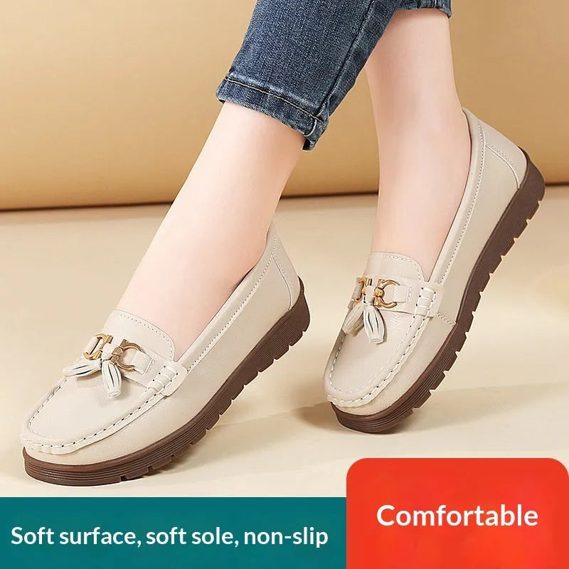 Women's plus size flat moccasins loafers with tassels, round toe, low wedge heel, solid colour suede upper, slip-on style in beige, gray, and pink