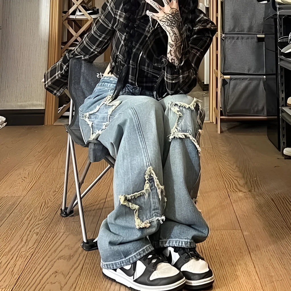 Women's wash blue high-waist straight-leg denim jeans on a hanger.