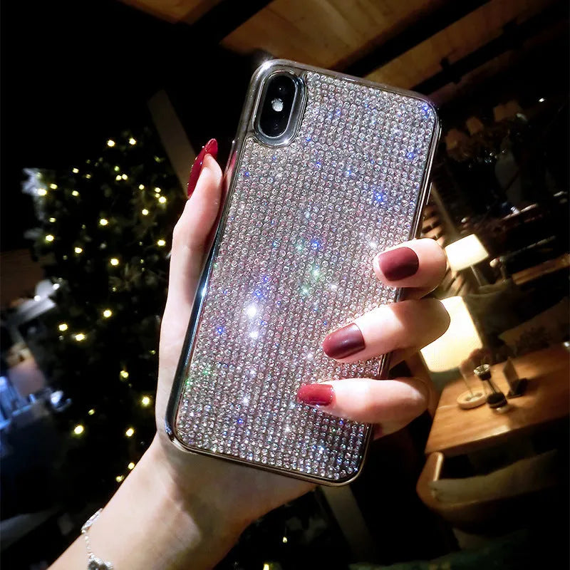 Silver rhinestone decorated silicone phone case for iPhone models showing full diamond pattern