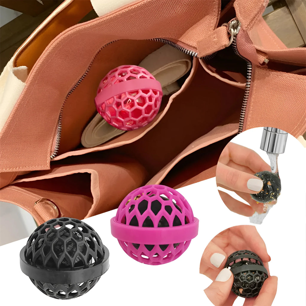 Reusable bag cleaning ball in pink colour on a clean surface