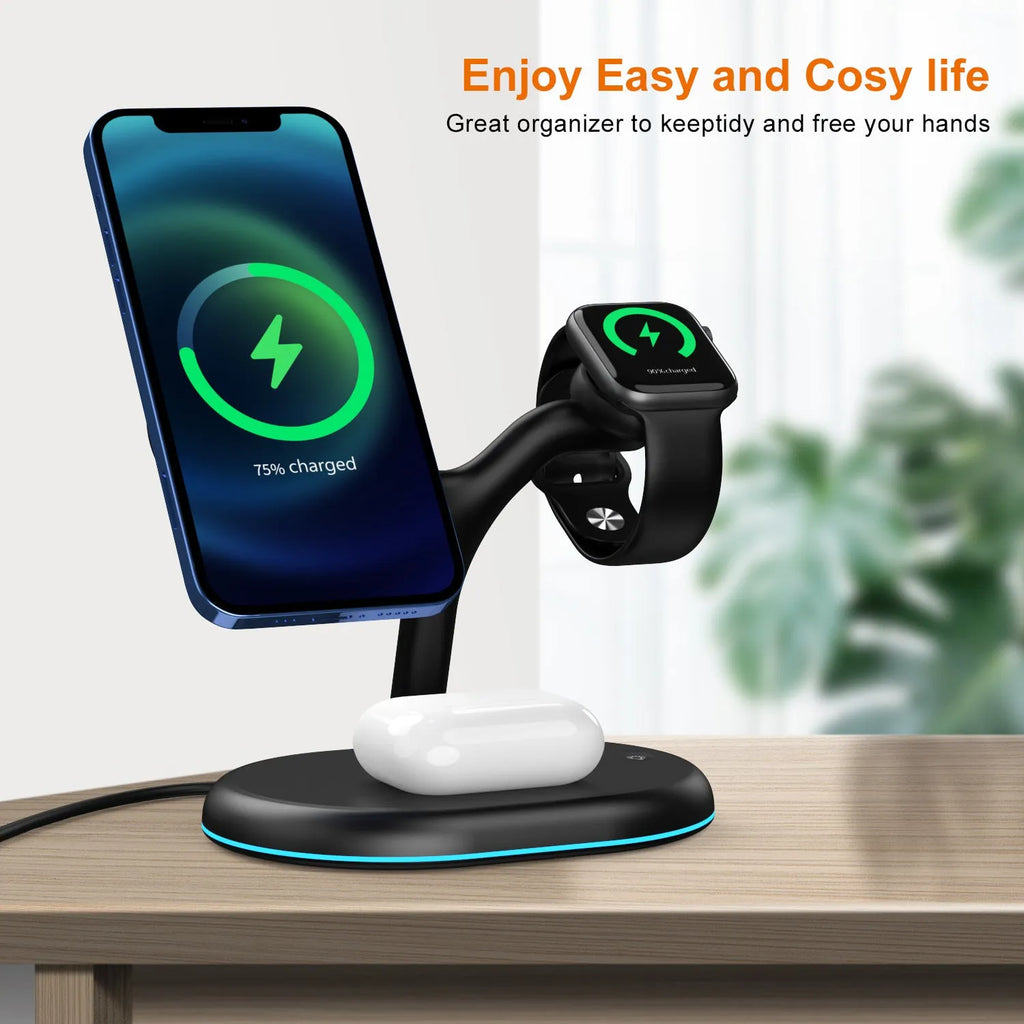 Black round wireless charging station with iPhone attached magnetically, Apple Watch on puck, and AirPods case on Qi spot.