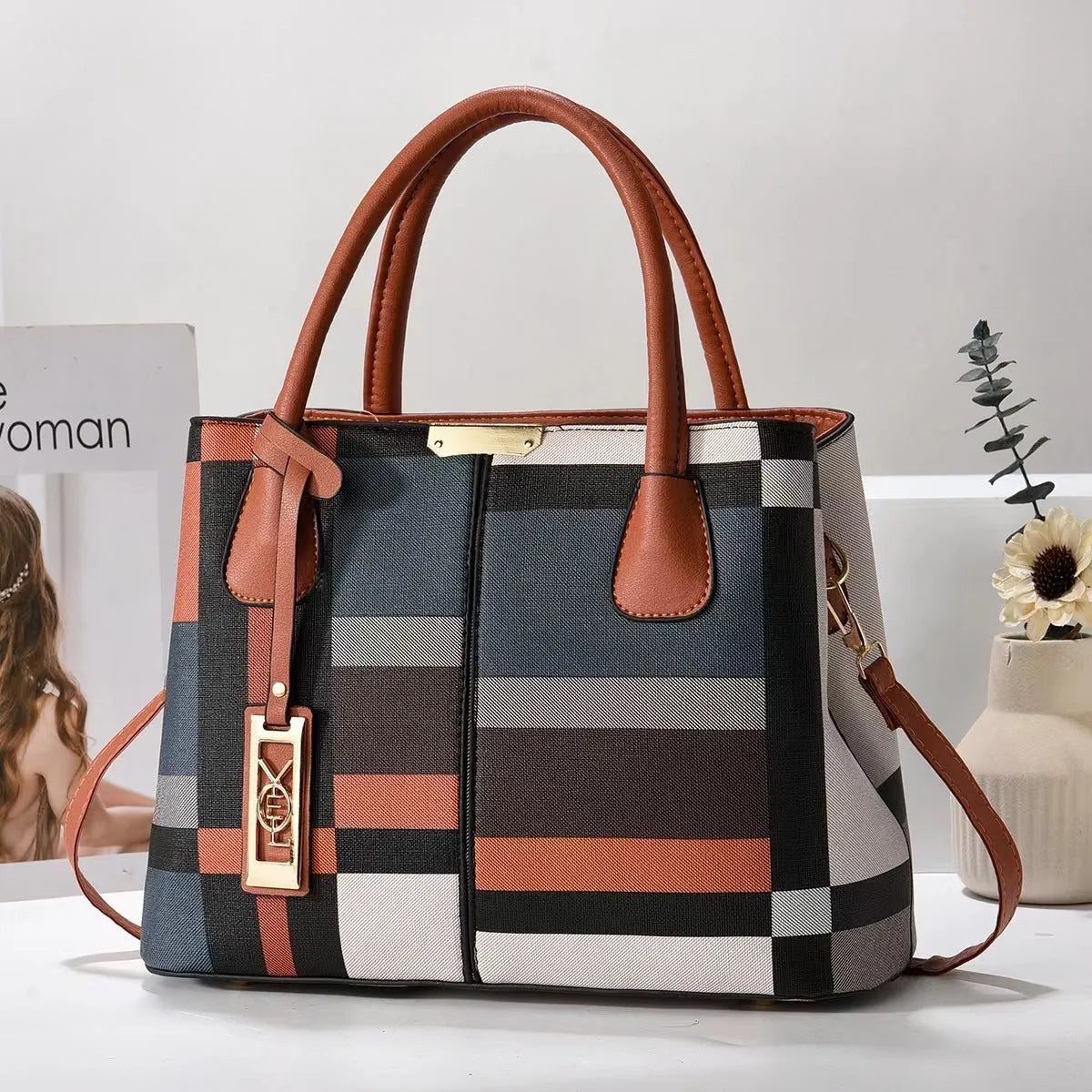 Soft PU leather large capacity shoulder bag for women in a horizontal square shape with an adjustable strap.