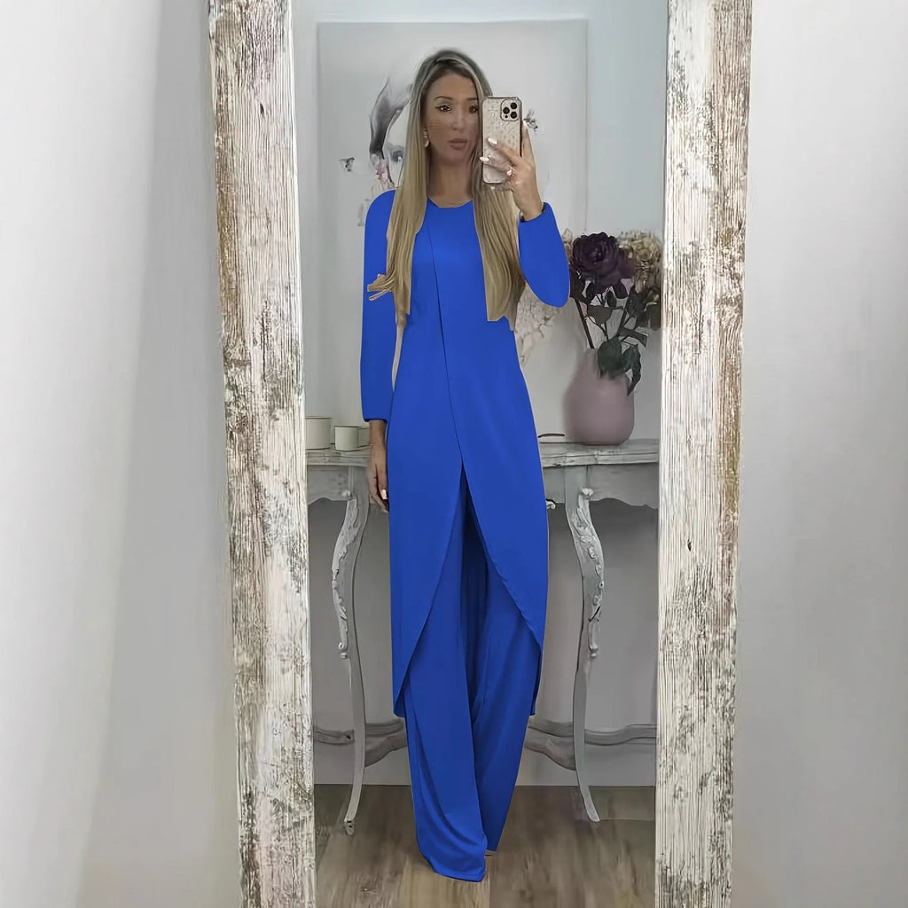 Casual long sleeve two-piece loungewear set in a neutral colour, showing the loose round neck top and matching trousers.