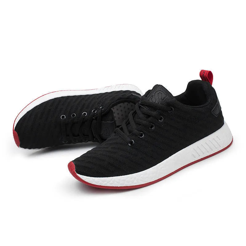 Men's Malcom low-top sneaker with mesh fabric upper and MD sole in black, grey, and white