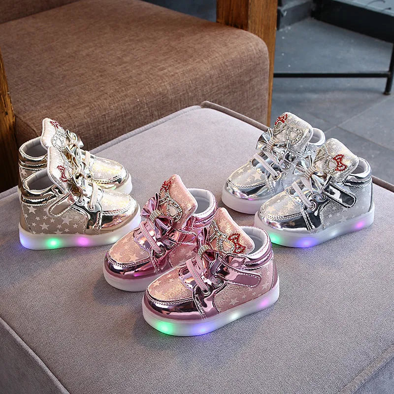 Children's LED light up shoes with magic button in golden, pink, and silvery colours