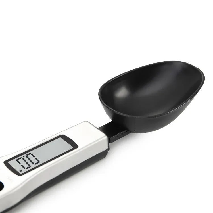 Smart digital measuring spoon with built-in electronic scale showing 0-30ml volume capacity