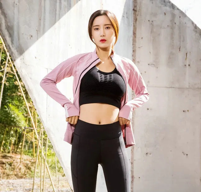 Slim fit sportswear coat in grey, 90% nylon and spandex, women's size M, front view