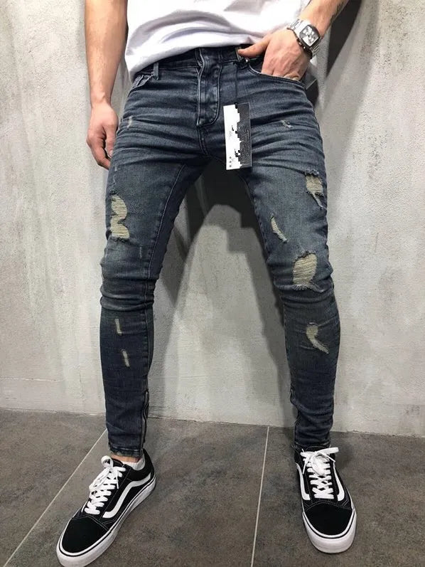 Men's gray blue stretch biker jeans with hole details, slim fit, on a model