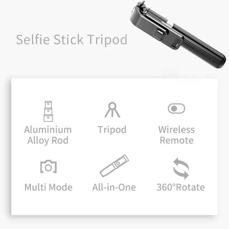 Black aluminium selfie stick with tripod base extended to mid-length next to an iPhone.